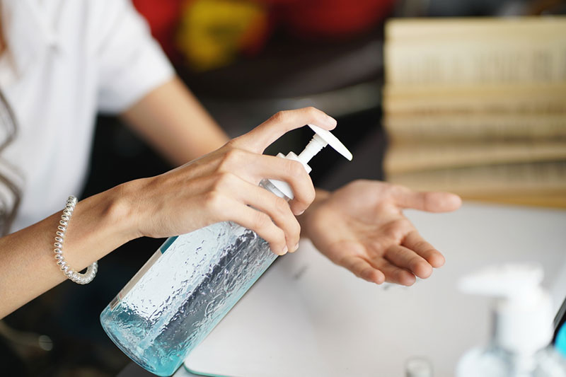 Women-washing-hands-with-antibacterial-soap-sanitizer.jpg
