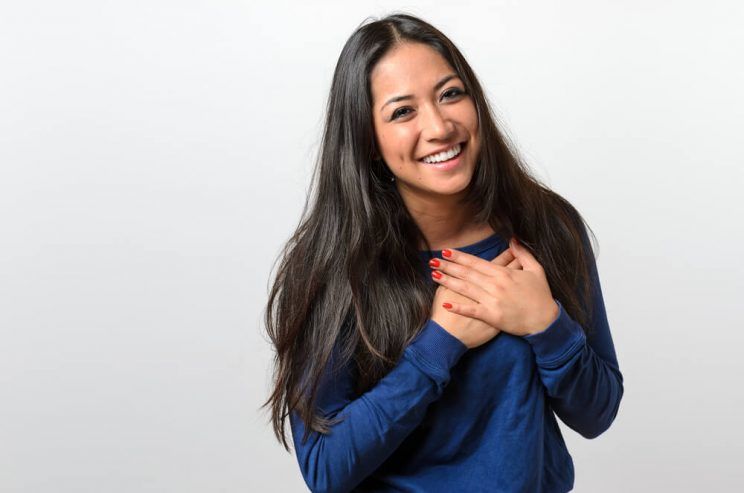 Young-woman-showing-her-heartfelt-gratitude-e1461303474870.jpg
